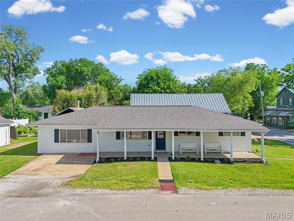 Rare commercial opportunity in the heart of historic Kimmswick! This retail building offers a flexible floor plan, half bath, and great location next door to the famous Blue Owl Restaurant, one of Kimmswick’s most recognizable visitor destinations. The property also includes a separate finished 14’ x 33’ outbuilding with electricity, offering valuable additional space for storage, shipping fulfillment, a workshop, studio, office, seasonal retail, or potential future rental use with improvements. Located among Kimmswick’s charming shops, restaurants, festivals, and day-trip attractions, this property is well-positioned for a boutique, gift shop, art studio, specialty retail, home décor, antiques, or another creative business concept. An upcoming sidewalk improvement project is planned to better connect Kimmswick’s shops and bring pedestrian access right up to the front door, adding even more future upside.  Opportunities like this rarely come available in historic Kimmswick. The current business has been a beloved part of the community for 26 years, creating a long-standing retail presence in one of Missouri’s most established and recognizable shopping districts. With built-in foot traffic, tourism, community events, and year-round visibility, this is more than just a building purchase. It’s a chance to become part of a thriving destination community and bring fresh energy to the next chapter of this special location.