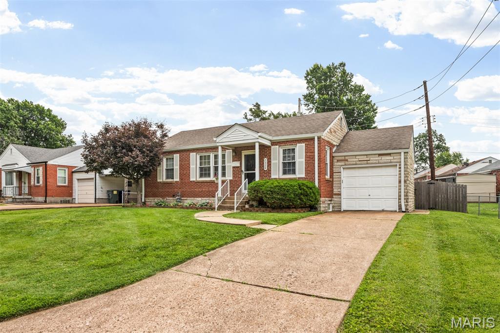 Located right across the street from St Marcus Park and the River Des Peres Greenway, this awesome 2 bed, 1 bath brick ranch is fully outfitted with great flow, natural light, beautiful hardwood floors, fresh paint, a garage with a new door/motor, and the option to expand into a generous additional living space in the dry basement.  Located just a skip-and-jump to several major thoroughfares while tucked privately into a quiet pocket of a Boulevard Heights, you'll enjoy original mid-century charm as you enter the heavy vintage front door which swings into a generous open-planned space well-situated for both living and dining. From here choose either the direction of a large kitchen with bonus pantry space, or the path to two private bedrooms and a charmingly updated full bath. Downstairs the basement has plenty of headroom, and is semi-finished with fabulous original wood paneling and decorative fireplace. Out back discover a HUGE level yard with a covered patio and fencing for the pups. Off-street, garage parking rounds out this super home that includes newer hvac, water heater, dishwasher and gutter system, and awaits a new, lucky owner. Could it be you?!