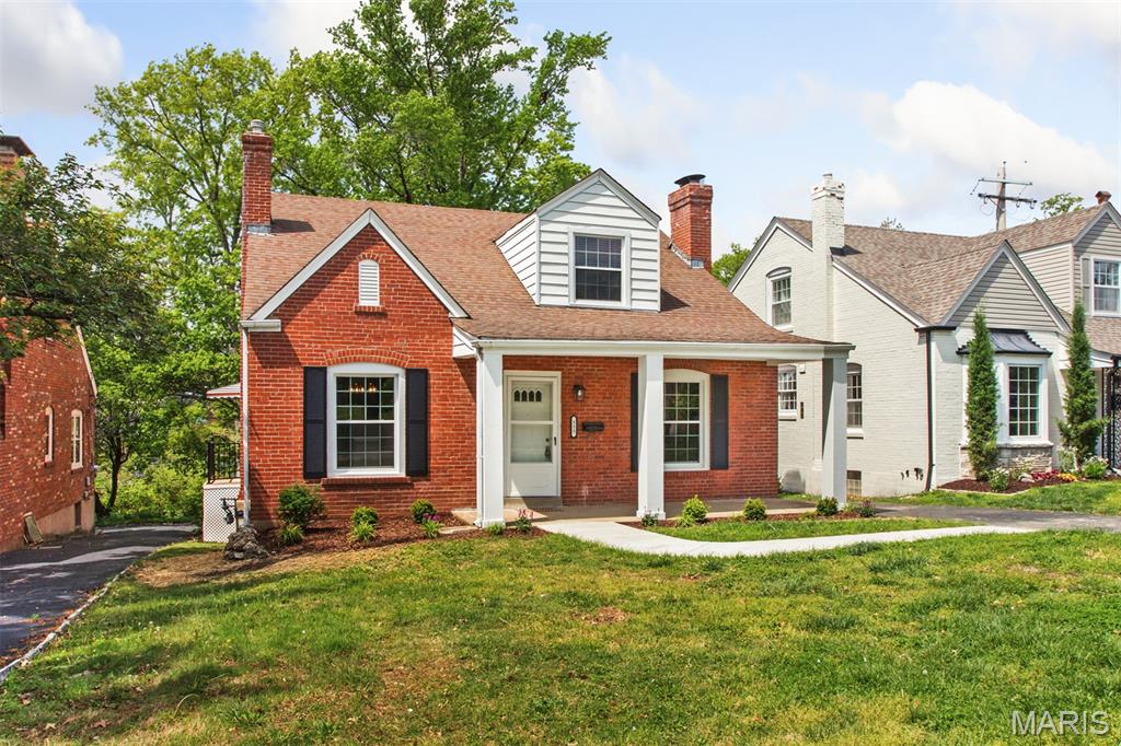 NEW PRICE!  ONE BLOCK FROM CLAYTON!  Beautiful and complete renovation. Brick 1.5 story in desirable University View neighborhood. 4 bdrs, 2 full baths including a primary suite on the second floor. Prime bath was completely gutted and redesigned. Other 2nd floor bedroom has access to bath thru a separate entrance. Full kitchen renovation including custom cabinets, storage pantry, stainless steel appliances and granite countertops. One main floor bedroom has a bonus room for office or sitting room. & Refinished hardwood floors throughout. Lower level is partially finished with carpeting and a gas fireplace. Separate laundry room in lower level as well. Interior freshly painted. 1 car basement garage with door/opener.