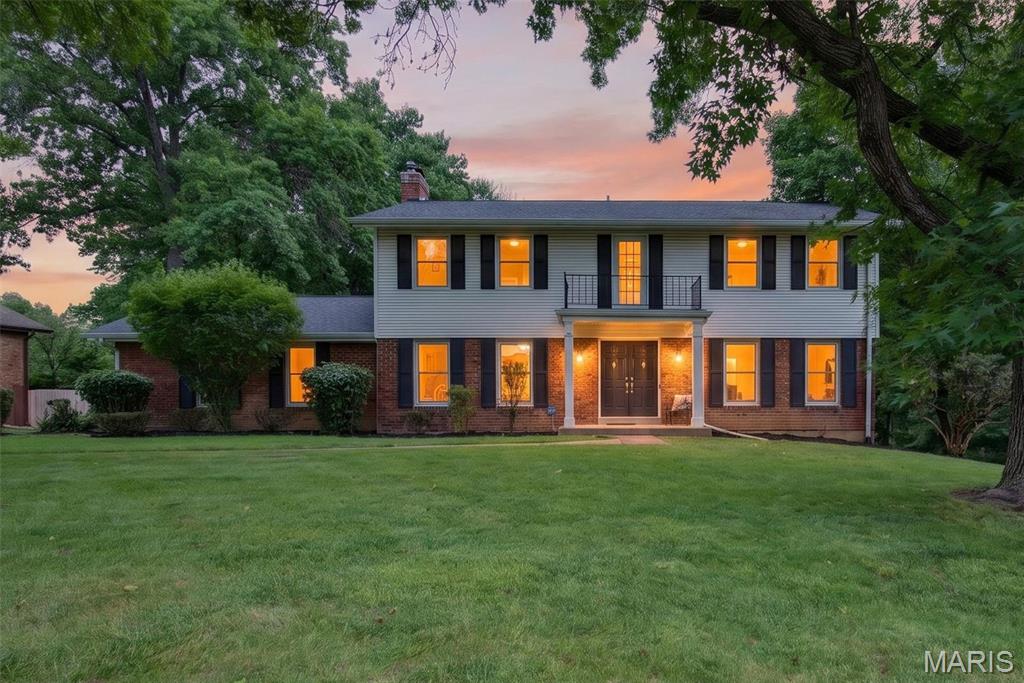 Tucked away on a quiet cul-de-sac with a private backyard backing to mature trees, this 4 bed 3 bath brick two-story offers over 3,300 square feet of living space in a desirable Chesterfield location. Step inside to a spacious entry foyer where new luxury vinyl plank flooring flows through the foyer, living room, and dining room. Fresh neutral paint throughout and new carpet on the staircase and upper level create a bright, move-in-ready feel. The classic central hall floor plan showcases an open staircase, formal living and dining rooms, and a welcoming family room featuring a wood-burning fireplace. The kitchen opens to the breakfast room, providing the perfect space for everyday living and entertaining. The main floor laundry off of the kitchen is a great convenience! Upstairs, you’ll find four generously sized bedrooms and two full baths, including a spacious primary suite with its own private bath. The finished walkout lower level expands the living space and offers endless possibilities for a recreation room, home gym, media room, playroom, or home office. Step outside and enjoy the peaceful, tree-lined backyard setting, offering privacy and room to relax, entertain, or play. Additional highlights include a two-car attached garage and a one-year home warranty for added peace of mind. Conveniently located near shopping, dining, parks, and major highways, this move-in-ready Chesterfield home combines space, updates, and a fantastic setting—all waiting for its next owner to bring their finishing touches.