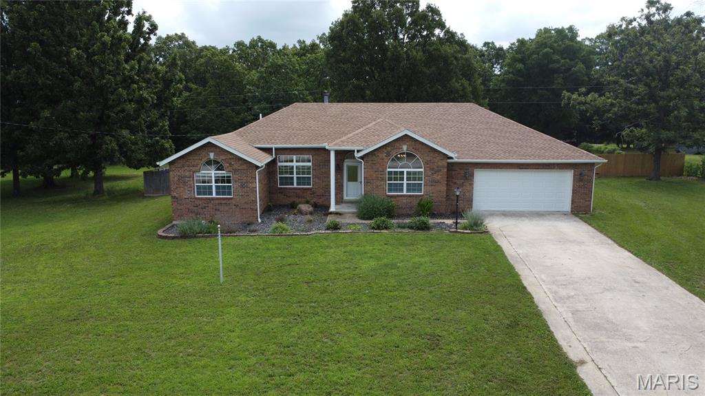 Welcome to 26266 Rambling Lane in Richland, where peaceful country living meets modern updates. Situated on a full acre, this well-maintained home offers plenty of space both inside and out.

The fully fenced backyard is perfect for entertaining, while the storage shed with loft provides ample room for tools, equipment, or hobbies. Enjoy relaxing on the freshly painted deck overlooking your private backyard.

Inside, you'll appreciate the many recent updates, including a new HVAC system, microwave, stylish kitchen backsplash, updated light fixtures, fresh paint, and new cabinet hardware throughout the home, giving it a clean, modern feel. The roof was replaced in 2025 with architectural shingles, providing peace of mind for years to come. The front section of the fence has also been newly installed.

If you've been looking for a move-in ready home with acreage, modern updates, and room to enjoy the outdoors, this property is one you won't want to miss. Schedule your private showing today!



Some listing photos have been virtually staged using AI to illustrate the property's potential. Furniture and décor shown are for visualization purposes only and are not included with the sale.