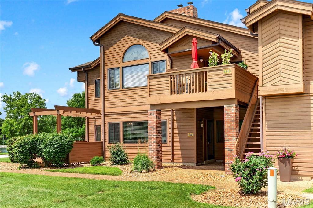 Welcome to 1401 Hemingway Ln which featureseasy, lakeside living in the highly desirable Chapter One community of Weldon Spring! This beautifully maintained 2-bedroom, 2-bath home offers 1,332 square feet of comfortable single-level living with an attached 2-car garage for convenience, security and extra storage. Enjoy peaceful lake views and a low-maintenance lifestyle in one of this desirable community.

The open floor plan provides spacious living with a cozy fireplace and dining areas filled with natural light, while the functional layout is perfect for everyday living or entertaining. The primary suite features a private bath, with a second bedroom and full bath ideal for guests or a home office.

Step outside and take advantage of everything Chapter One has to offer. Just a short walk from your front door, you'll find the community clubhouse, swimming pool, and scenic lake, making it easy to enjoy recreation and relaxation year-round.

Conveniently located near shopping, dining, walking trails, and major highways, this is a rare opportunity to enjoy a carefree lifestyle in one of St. Charles County's most sought-after communities. Schedule your showing today!