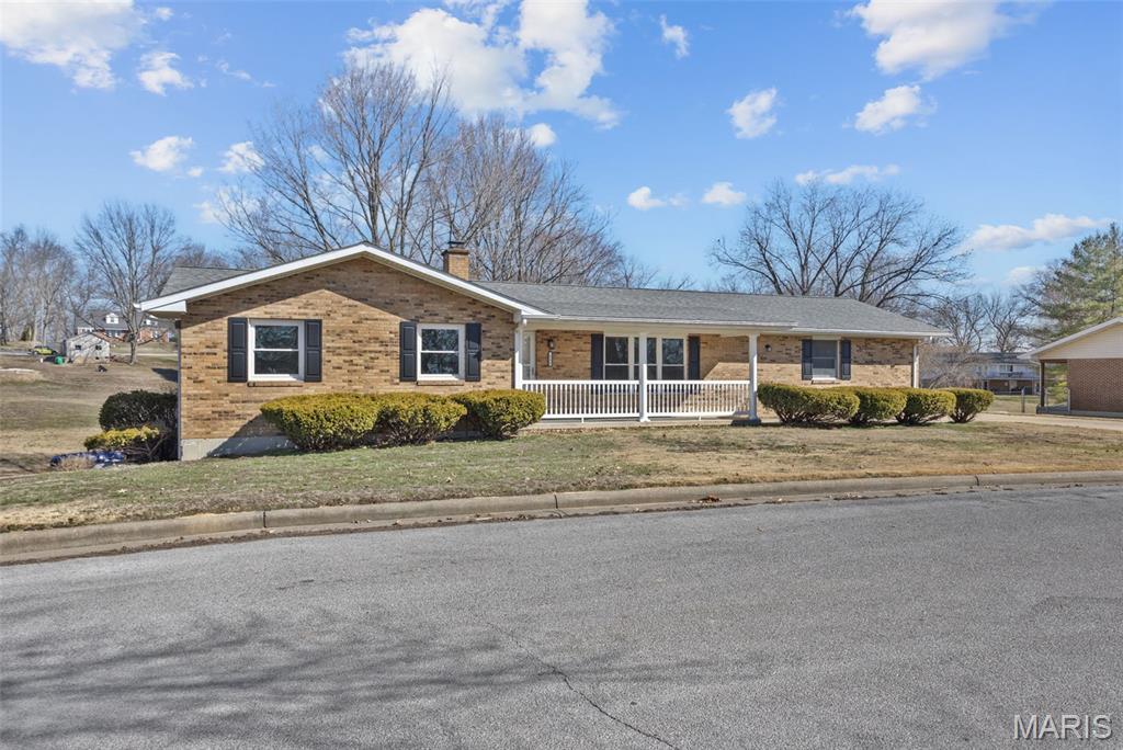 Dont wait... Located close to downtown, this 4 bedroom, 2 full bath, full brick ranch at 235 Gerard St offers approximately 2,500 square feet of finished living space on a large town lot on a quiet dead end street. This well maintained and fully remodeled home combines classic construction with modern updates in the heart of historic Ste Genevieve. The main level features an open floor plan with new flooring, brand new roof, gutters, downspouts, exterior patio doors, updated windows, remodeled bathrooms, and a beautifully updated kitchen complete with brand new stainless steel appliances. A new covered deck extends the living space outdoors and overlooks the landscaped backyard and above ground pool- creating a private, park like setting ideal for relaxing and entertaining. The finished walkout basement includes a large family room with fireplace, walkout access to a generous concrete patio and additional flexible living space, bringing the total finished area to approximately 2,500 square feet. New Pella sliding doors on both levels enhance natural light and provide easy access to outdoor areas. New Roof on 4/15/2026 offers added value and peace of mind. Additional features include an expansive driveway and attached three car garage providing ample parking and storage. Located within the Ste Genevieve School District and just minutes from downtown, schools, and the shopping district- this property offers both convenience and a quiet residential setting in the heart of it all!