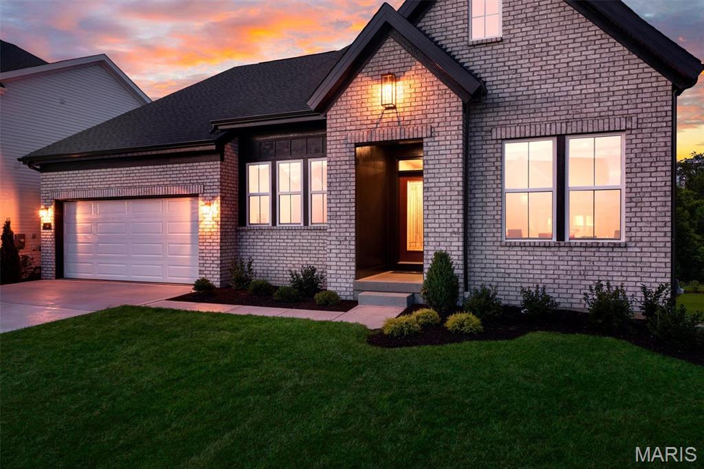 Rare opportunity to own one of the final Fischer Homes Emmett floor plans in Inverness! With no remaining homesites available to accommodate this highly sought-after ranch design, this beautifully upgraded home offers an exceptional combination of timeless style, thoughtful craftsmanship, and immediate availability. Featuring 3+ bedroom, 2.5 bathrooms + a rough-in, and ~3000 sq ft of finished living space. Perfectly positioned on a premium walkout homesite, the open-concept floor plan features a raised great room ceiling, luxury vinyl plank flooring, abundant natural light, and a dramatic floor-to-ceiling shiplap fireplace that anchors the living space. The chef-inspired kitchen showcases 42" painted soft-close cabinetry with dovetail drawers, Carrara Marmi quartz countertops, designer tile backsplash, built-in wall oven and microwave, SS gas range, vented chimney hood, oversized island, and exceptional storage with pull-out shelving, pot & pan drawers, and a built-in waste basket. The front room is desgined to be the ultimate flex space (a private study offers the perfect work-from-home retreat, formal dining room, or addtional sleeping area). The luxurious primary suite features a tray ceiling, spacious walk-in closet, and spa-inspired bath with a floor-to-ceiling tiled shower, ceramic bench, double raised vanity, and dressing drawer. An impressive 9' sliding glass door opens to the oversized covered deck overlooking the walkout backyard, creating seamless indoor and outdoor living.  Main level is rounded out witha 2 additonal guest bedrooms, walk-in pantry, family foyer, and main floor laundry room. The finished walkout lower level adds nearly 800 square feet of versatile living space with a spacious recreation room and bathroom rough-in, providing outstanding flexibility for future expansion. Additional highlights include a WiFi thermostat, whole-house humidifier, structured wiring, upgraded lighting package, expanded driveway, professional landscaping, and an attractive English Elevation with premium brick façade. Enjoy the lakes, walking trails, parks, and golf-cart-friendly lifestyle that make Inverness one of the area's premier communities. This is a unique opportunity to own a beautifully upgraded Emmett in a community where this floor plan can no longer be built.