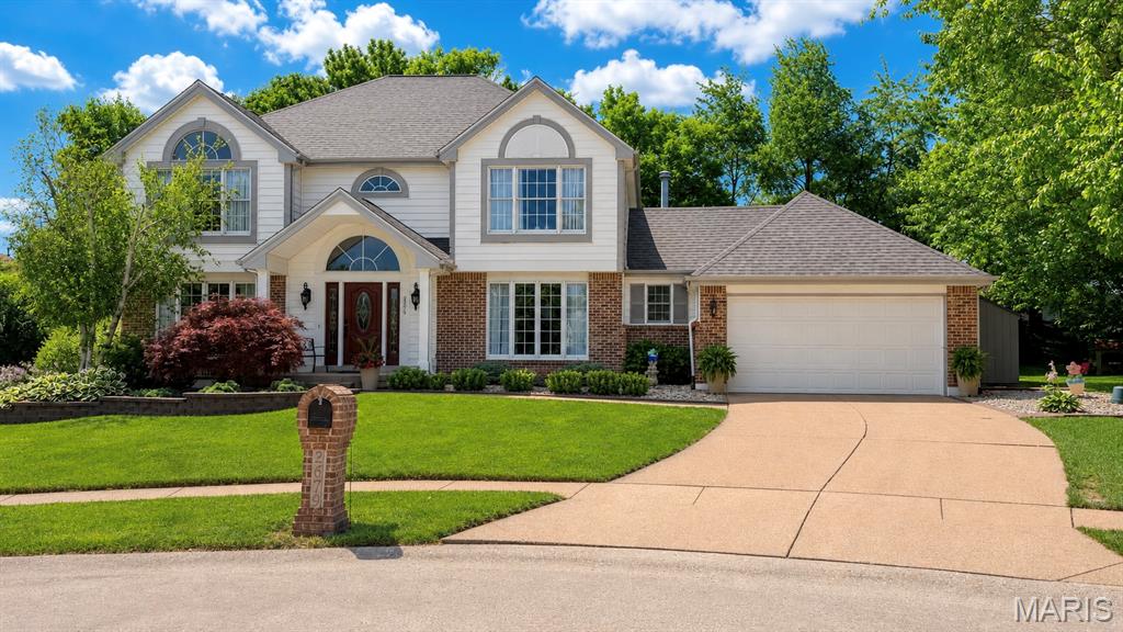 WELCOME HOME — This beautiful two-story home is ready for its next chapter! From the moment you step inside, you’re greeted by a grand two-story entry foyer and a newly updated spindled open staircase that sets the tone for the rest of the home.
The entry flows seamlessly into a formal dining room and a versatile flex space—perfect for a home office—leading into the inviting family room featuring custom built-ins, a gas fireplace, and a large bay window overlooking the private backyard.
The vaulted eat-in kitchen is designed to impress, showcasing updated granite countertops, stylish backsplash, new tile flooring, a newly added built-in pantry, black stainless appliances, updated lighting, and a convenient wet bar connecting the breakfast room and family room—ideal for entertaining and holiday gatherings.
Additional main-level features include a laundry/mud room and updated guest bathroom.

Upstairs the spacious primary suite offers a vaulted ceiling, an updated luxurious ensuite bath, and a large walk-in closet. Three other bedrooms and updated full bath complete the upper level. 
The finished lower level provides abundant additional living and entertaining space, along with a flexible bonus room to suit your needs.
Some updates include new siding (2018), roof and skylight (2022), and furnace and A/C (2019), offering peace of mind for years to come.
Situated in a prime location, this home truly has it all—schedule your showing today!