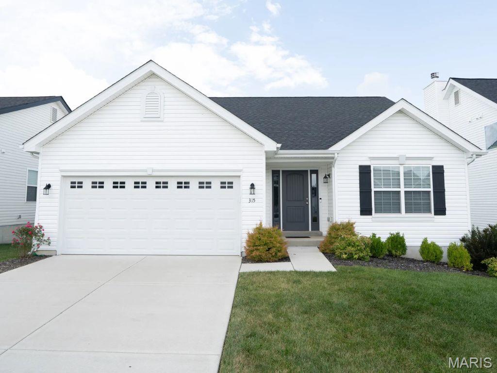 McBride Homes’ Aspen II 3BR, 2BA ranch-style home ready this summer! Enjoy an open floorplan with vaulted ceilings, 6ft windows, & beautiful wood laminate flooring in main living areas. The kitchen has a large island with a breakfast bar, Winstead Burlap 42” cabinets, quartz countertops, stainless steel GE appliances, & large walk-in pantry. The dining area has a sliding glass door that leads to a future covered patio area w/ a ceiling fan prewire. The primary suite has a large window, dual closets, & private primary bath w/double sinks & walk-in shower. Two extra bedrooms & full hall bath add convenience. Other extras include main floor laundry, ¾ bath rough in at LL, two panel white interior doors, ceiling fan prewires, plus garage coach lights. Louiselle Park is located just minutes from Creve Coeur Park with quick access to I-270 and Page Avenue. Enjoy peace of mind with McBride Homes’ 10yr builders’ warranty & incredible customer service! Similar photos shown.