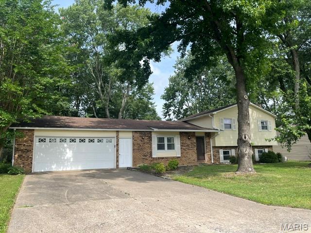 Welcome home to this beautifully maintained tri-level in one of Cape Girardeau's established neighborhoods. Offering 4 bedrooms, 2.5 baths, and a 2-car garage, this home is designed for comfortable everyday living and easy entertaining.

The heart of the home is a warm and inviting family room anchored by a wood-burning fireplace — the perfect gathering spot on cool Missouri evenings. Step outside to the screened porch and enjoy peaceful views of the backyard, ideal for morning coffee or weekend relaxation.

All three bathrooms have seen recent updates, giving the home a fresh, move-in-ready feel. The master bath features a new countertop, sink, and flooring. The hall bath has been refreshed with new flooring, a new countertop, sink, and toilet. And the lower-level bath received a new countertop and sink as well — clean, updated, and ready for the next owner.

With thoughtful improvements throughout and a layout that maximizes every square foot, 535 Woodbine offers the space, charm, and functionality today's buyers are looking for. Schedule your private showing today!

There is a French drain along the garage end of the home that functions well bringing rain water to the street,.
Sewer line was replace in 2022 from the home to the street, seller has a city pickup scheduled for 7/8/26