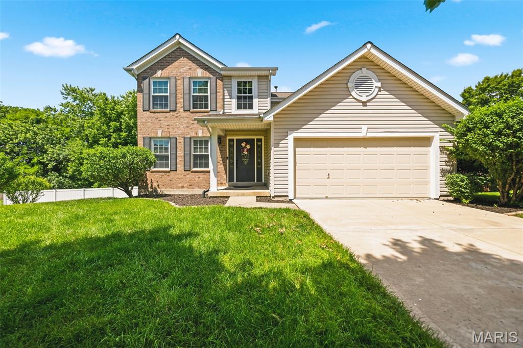 This well maintained and fully updated 2-story home offers 4 bedrooms and 3.5 baths with luxury vinyl plank flooring throughout. Spacious living room offers flexibility and plenty of space for entertaining. The open kitchen features upgraded cabinetry, concrete countertops, stainless steel appliances, a luxury lighting package, and refrigerator to stay. Main floor laundry includes washer and dryer. Primary bedroom retreat has dual closets and en-suite with walk-in shower. Two more spacious bedrooms, full shared bath, and linen closet complete the second floor. The finished walkout basement adds additional living space with a 4th bedroom, full bath, recreation area, and sliding door access to the backyard. Composite deck offers plenty of space for entertaining and enjoying the private backyard. Situated on a cul-de-sac lot backing to trees, the fully fenced yard provides privacy in the highly sought-after Hutchings Farm neighborhood, conveniently located near shopping, schools, and highways. Neighborhood amenities include a pool, tennis courts, basketball courts, walking trails, and clubhouse. Move-in ready!