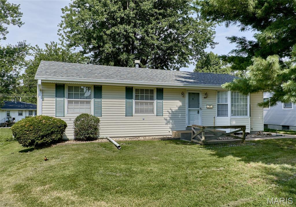 You don’t want to miss this charming 3 bedroom, 3 bathroom ranch home with tons of amazing features! This home boasts beautiful hardwood floors, spacious sunroom, detached garage and carport, finished lower level, and more! Enter into the light & bright living room with wood flooring and bay window open to the dining room. The eat-in kitchen features custom cabinetry, pantry, and access to the large sunroom perfect for enjoying your morning coffee. The spacious, level, and fully fenced backyard boasts plenty of space for outdoor activities and a detached garage with carport for plenty of parking. The primary bedroom features wood flooring and a convenient en-suite half bathroom. 2 additional bedrooms and a full hall bathroom complete the main floor. You’ll love the additional living space in the partially finished lower level with spacious rec room and full bathroom in addition to lots of storage space. Great location just minutes from Lindbergh shopping and restaurants, and walking distance to St Louis County Library and Bangert Park with pool, playground, trails, and more. Come see this adorable ranch home today!