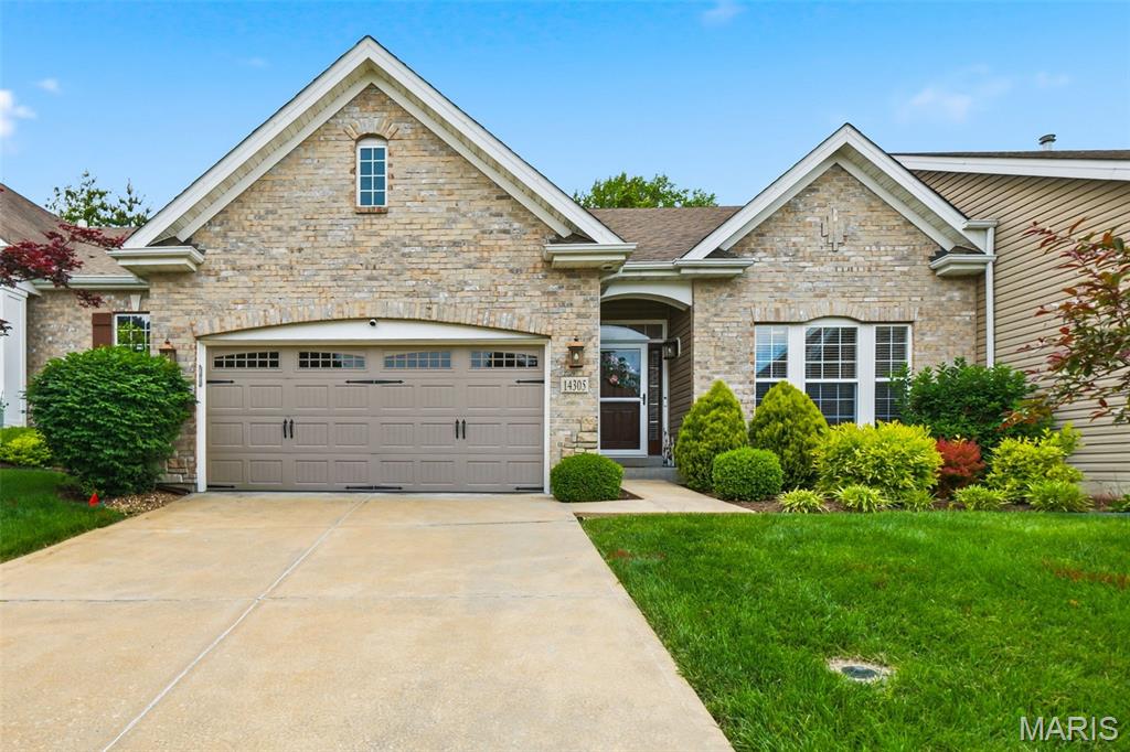 If you’ve been looking for low-maintenance living without giving up space, privacy, or functionality, this Chesterfield ranch-style villa is worth a look. Welcome Home! Tucked near the end of a quiet cul-de-sac and backing to a wooded area, this 3-bed, 4-bath home offers a peaceful setting with room to spread out on both levels. Hardwood floors welcome you into the foyer, where a bright flex space with a full bath and walk-in closet can easily serve as a home office, den, or guest area. The main living room features a fireplace, 9-ft half-vaulted ceiling, and natural light flowing in from the back of the home, while the eat-in kitchen is equipped with stainless steel appliances, a gas range with hood, and space for everyday living and entertaining. The primary suite offers vaulted ceilings, dual vanities, a separate tub and shower, and a custom walk-in closet. Downstairs, the fully finished lower level gives you even more flexibility with a massive rec space, wet bar, additional bedroom, and full bath. Step outside to the composite deck already routed for a gas grill hookup and enjoy wooded views and added privacy rarely found in villa living. Thoughtfully designed with an integrated whole-home speaker system extending throughout the living spaces, bedrooms, and bathrooms. With a 1-year-old HVAC system and a location in one of Chesterfield’s most desirable areas, this home combines comfort, convenience, and a layout that simply makes sense.