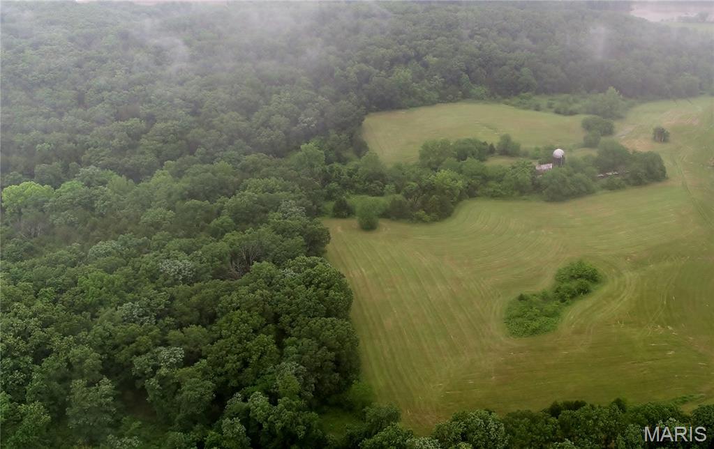 403 acres of mixed habitat and river frontage. Dream; Recreation, Riverfront property and Country Home sites. Includes connected 5 acre tract on county road with water and electric. Deeded road to the back of the main property. Great Hunting and Fishing; monster bucks, turkey, quail and great smallmouth bass. Just under a mile of Gasconade River frontage with additional river easement, 3 mile float from Paydown access. Hunting habitat extraordinary. Mostly wooded, with ample open areas for food plots and large open area with old barn, silo and well. This tract is primary bedding and sanctuary area for surrounding hay fields. Scenic views. House with 2,100 sf living space, 3BR, 2 BA is AVAILABLE (see LandCom Property ID 24919018).  HARD TO FIND a tract this large and with Gasconade River frontage. Proof of funds required.  The Entire 778 +/- acres is listed for $3,595,000, Tract 2:  204 +/- acres listed for $895,000, Tract 3: 165 +/- acres listed for $907,500. These tract sizes can be reasonably adjusted.