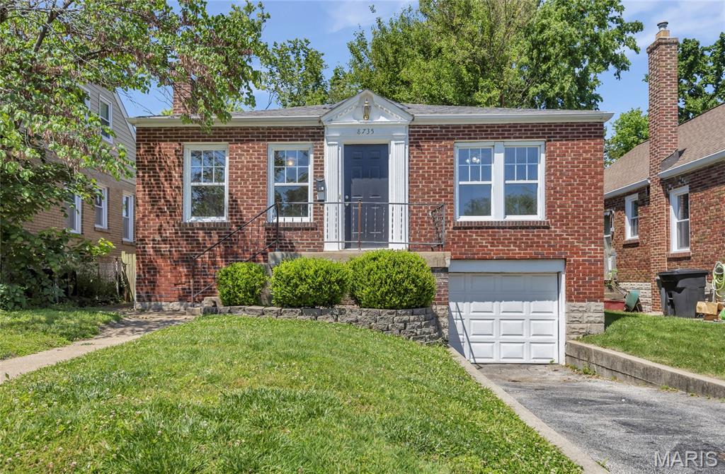 Picture perfect brick home has it all! Gleaming hardwood floors greet you and extend throughout. Absolutely beautiful! Live the good life in the light & bright living room. Pass through the classic arched entry to the separate dining room - wonderful for everyday, or more formal, dining. Check out the amazing kitchen! Gorgeous cabinets with slide-out shelving, drawer organizers, lazy susan corner cabinets, and soft-close features. You don't find this kind of quality cabinetry in homes twice this price! Spectacular granite counters provide a perfect complement to the cabinetry and stainless steel appliances. Truly a chef's dream kitchen! Two spacious bedrooms with lots of natural light pouring through vinyl insulated windows. Nice closet space, too. Updated full bath sparkles with classic tile floor. You'll truly appreciate the convenience and security of the attached garage! Walkup basement offers plenty of storage space  and give you easy access to the level rear yard and awesome brick patio. Fabulous location off of Brentwood Boulevard has you close to everything Brentwood has to offer:  easy access to major interstates, Brentwood MetroLink station, shopping at The Promenade and Brentwood Square, grocery stores including Trader Joe's and Whole Foods, plentiful and varied restaurants such as O.B. Clark's, Bonefish Grill, and Mai Lee, top-ranked Brentwood schools, and exceptional parks and recreation facilities including Brentwood Park and its Deer Creek Greenway connection for the outdoor lovers in the home. Make this impressive home yours today!!!