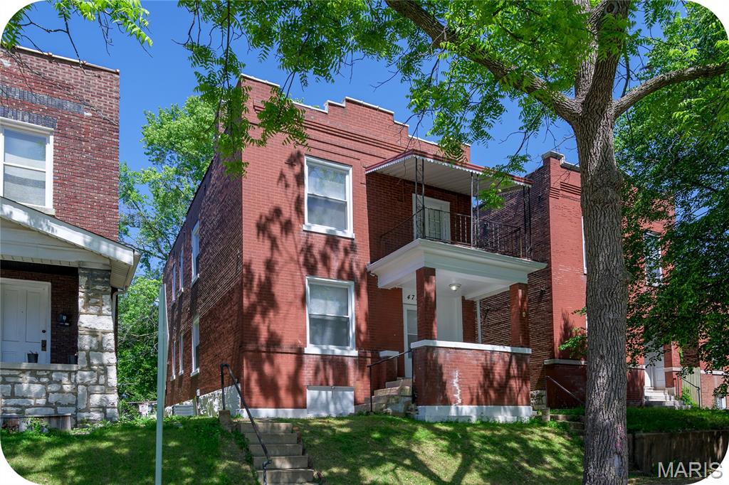 Classic South City brick charm meets modern updates in this spacious 2-story, 4 bed, 2 bath historic home priced to sell at just $199,000! Packed with value, this beautifully refreshed home offers a flexible layout, stylish updates, and plenty of space to spread out. The main floor features a welcoming living room with fireplace, a main floor bedroom, full bath, and an updated eat-in kitchen with white cabinetry, granite countertops, stainless steel appliances, and a gas range. Upstairs, you'll find refinished hardwood floors, 3 additional bedrooms, and a second full bathroom. The oversized front bedroom includes a walk-out patio plus a large adjoining bonus room perfect for a home office, massive closet, sitting room, nursery, or playroom. Two additional bedrooms are tucked toward the back of the home. Walkout basement offers additional storage and potential, while the fenced backyard provides space to relax, entertain, or play. Major updates include new roof, new windows, new stack, fresh paint, and many more improvements throughout. A rare opportunity to own a spacious, updated historic home in South City at an incredible value!