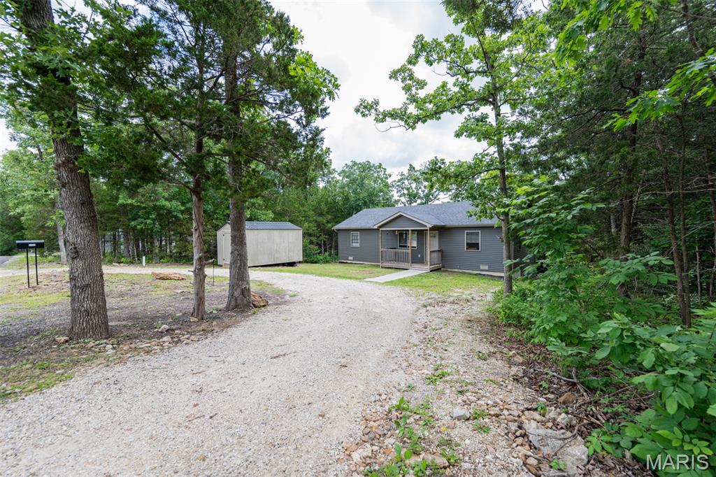 Looking to live in a private lake community? This recently built 3-bedroom, 2-bath home is nestled in the private community of Peaceful Valley Lake. This home has it all, featuring a spacious open floor plan, walk-in pantry, breakfast bar in the kitchen, and a primary suite complete with a walk-through closet and private bath/laundry area. When you walk in, the first thing you’ll notice is the high vaulted ceilings that really open up the space.

If you’re curious about lake life, Peaceful Valley Lake offers plenty of amenities, including a 185-acre lake, beach areas, tennis courts, clubhouse, picnic areas, campgrounds, playground, and community pool. Whether you enjoy fishing or spending time out on the water in your boat, come check out everything this home has to offer.