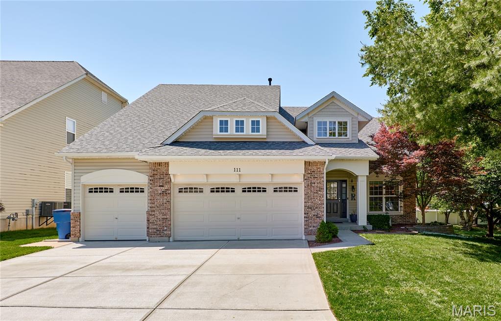 SHOWINGS START 5/29/26... NEW AC AND HOT WATER HEATER 5/27/26..WELCOME TO THIS MOVE-IN-READY, BEAUTIFUL 1.5-STY IN THE MANORS OF ORCHARD GLEN! You will be wowed the moment you drive up to the newer driveway, curb appeal and three-car garage. This floorplan is inviting, light and bright with soaring ceilings, wall of transom windows and neutral decor and new 2026 hardwood on main level! Main floor laundry & primary bedroom with walk-in closet, separate soaking tub and shower, double vanity. Three upper bedrooms plus a loft (convenient for office), plus upper planning desk. An amazing finished lower level with game room, tv rec room, full bath, two storage areas and two incredible closet rooms and egress window! Partially fenced yard with patio and next to open common ground.