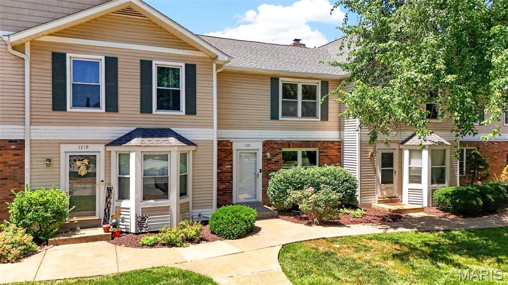 With scenic pond views, spacious interior, and exceptional community amenities, this townhome offers a lifestyle you'll love coming home to. Featuring over 1,600 Sqft of total living space, main floor laundry, updated flooring, fresh paint throughout, and two very generously sized bedrooms offering both comfort and privacy. The partially finished lower level provides valuable additional living space with durable epoxy-coated floors and stairs, making it ideal for entertaining, a home office, or a fitness area. A dedicated storage room offers plenty of space for seasonal items and everyday organization. Step outside to your private vinyl-fenced backyard and enjoy the elevated deck overlooking the tranquil pond, a perfect backdrop for morning coffee, outdoor dining, or unwinding at the end of the day. Adding to the appeal, residents enjoy a carefree lifestyle with HOA-covered water, sewer, and trash services, plus exclusive access to the community clubhouse and pool. Located within the highly sought-after Francis Howell North School District and just minutes from major highways, shopping, dining, and entertainment, this home delivers the perfect balance of convenience and peaceful living.