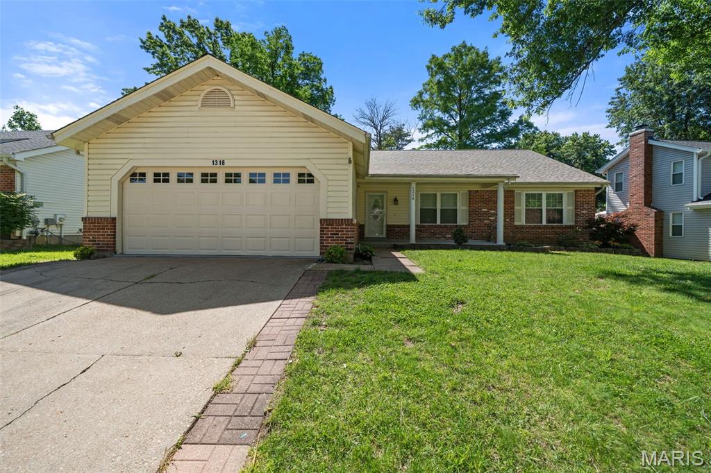 Located in the highly desirable Ballwin area this spacious 4 bed, 2 bath ranch offers a strong opportunity for investors or buyers seeking minor sweat equity in a prime West County location. The main level features vaulted ceilings, hardwood floors, and abundant natural light from newer windows, creating a solid foundation for future updates. The kitchen offers custom cabinetry, newer appliances, breakfast bar, and ceramic flooring with excellent potential for modernization. Multiple living spaces include a formal dining room, sunken living room, and large family room, providing flexible layout options. The finished lower level adds valuable additional living space with sleeping areas and a large recreation room. Exterior features include vinyl siding with brick front and an attached 2-car garage. Property is being sold as-is with a new roof already completed, offering a key recent upgrade. Home needs cosmetic updates but has solid structure, strong layout, and excellent upside in a convenient location near shopping, dining, and highways.