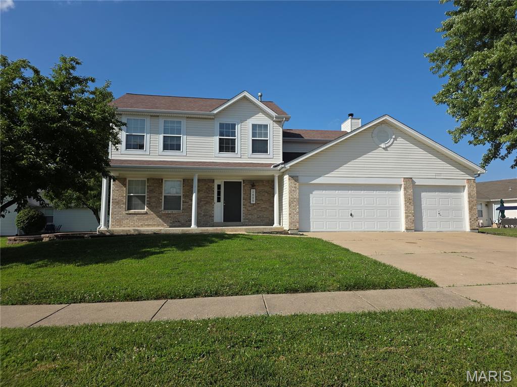 Welcome Home!  This 2 sty home is ready for it's new owner.  It has 4 bedrooms and 2.5 baths, formal dining, a great room with fireplace and bay window.   The kitchen has stainless appliances, tile flooring, granite counters, tile flooring and back splash, upgraded cabinets.  But wait....there's more.  There's a finished basement with a rec room, office/playroom and a 3rd full bath.  A 3 car garage is so convenient and spacious.   You didn't know you needed one until you have one!!  Off the back is a two level deck giving separation for outdoor cooking, dining, and entertaining.  Convenient location to I-70 and Wentzville Schools.  This home ticks all the boxes.