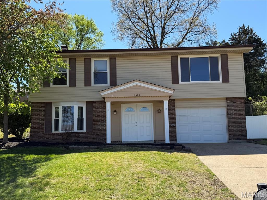 This charming split-level home features 4 bedrooms and 2 bathrooms with 1,654 sq ft of living space.  The main level has an open floor plan that flows well from the living room, kitchen, dining, and patio.  A glass, double-doors open to the back covered patio that provides extended living space. The kitchen offers two pantries with plenty of storage spaces.  The natural lights coming from the triple windows in the living room bring warmth and brightness in the rooms. Predominant throughout the main floor are the gorgeous hard wood floors. The 3 Bedrooms and 1 full bath are located on the main level. The finished lower level has an open, versatile space for your family needs with 1 bedroom, 1 full bathroom, 3-window bay, wet bar, and lots of cabinets for storage spaces.  Extra storage room on the hallway, storage shelves in the basement/tuck under garage, and a shed in the backyard for your lawn mower, tools, and supplies. Fantastic location! Close to McKelvey Elem Sch, YMCA, Community Center, Creve Coeur Park, and easy access to Greenway Bike Trail, shops, restaurants and I-270.  The home needs a little bit of TLC. Seller will credit buyer the amount of $3,000 at closing for minor repairs.