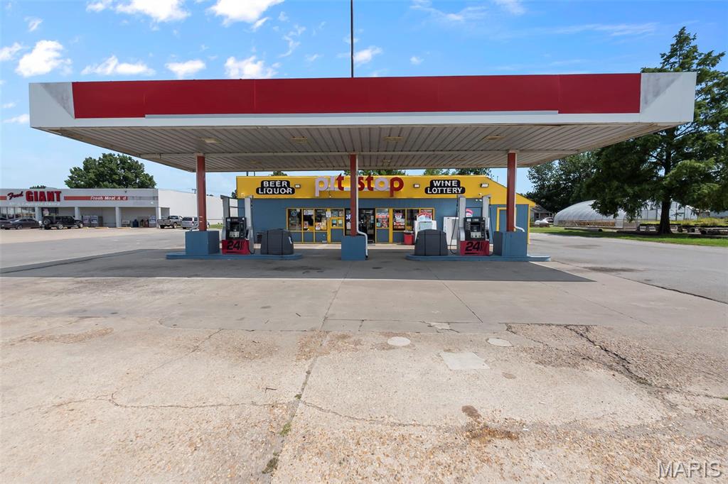 Exceptional investment opportunity! Lucky Mart is a well-established, successful convenience store offering a true turnkey business opportunity. Situated on nearly 3 acres (m/l) with approximately 4,000 feet of road frontage, the property enjoys excellent visibility and high daily traffic counts. The exterior has been updated with fresh paint, new lighting, improved signage, and a spacious parking area designed to accommodate customers with ease. The property also includes two gas pumps with above-ground fuel tanks. The sale includes an impressive selection of equipment and inventory, allowing the next owner to begin operations with minimal startup costs. Included equipment consists of, but is not limited to, a 9-door walk-in cooler, indoor retail shelving, wine and liquor display shelving, three glass-front display refrigerators, a stainless steel three-compartment commercial sink, a two-door beverage cooler, coffee machine, deep freezer, refrigerators, double-sided display cooler, and a 16-camera security system, along with select office supplies. Several revenue-producing leased items are already in place, including ice vending units, air machines, an ATM, Million-Dollar Club Lottery equipment, a two-door Coca-Cola cooler, Monster Energy cooler, and two fountain drink machines. Whether you’re an experienced operator or looking to expand your investment portfolio, this is an outstanding opportunity to take over an established business with the infrastructure, equipment, and customer base already in place. Hit the ground running and capitalize on the continued success of Lucky Mart.