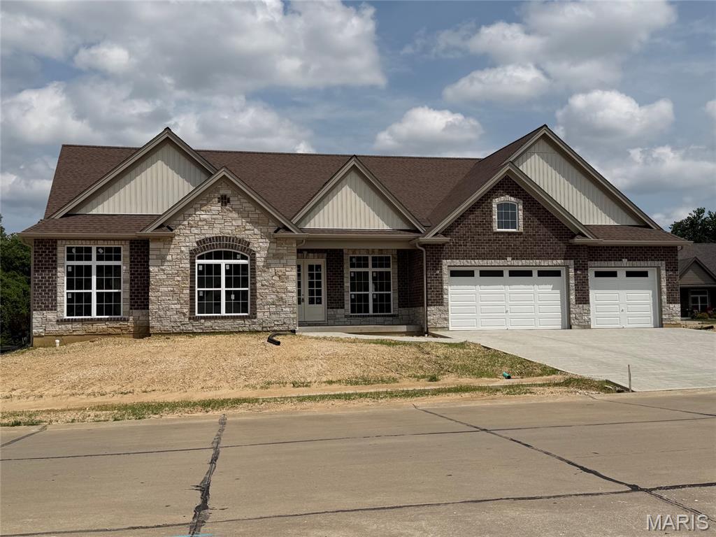 Update-  Cabinets are being installed this week!!   Do you really want New Construction without the months of hassle and waiting? Let's make this your dream home!!  Built by Executive Homes the Baywood XL is one of the most popular floorplans with a split bedroom layout.  This home is under roof and will be ready for it's new owner(s) before school starts..  Engineered wood flooring throughout, beautiful floor to ceiling see through fireplace in great room and on the covered patio.  The kitchen comes with Stainless Steel appliances including a gas range with an electric wall oven and microwave combination and a large center island.  The dining room  can be a study or office and the primary bedroom is coffered with a bay window.  In the primary bathroom you will find a freestanding soaking tub with dual vanities and walk in shower. 10 foot ceilings with 8 foot doors throughout.  All on one floor!! Bellevaux is an exclusive neighborhood with only 30 lots of Custom Homes all built by Executive Homes there is no through traffic in Bellevaux. Come see this one now!!  Please excuse our dust as this home is still under construction.  Please wear closed toe shoes for your safety.