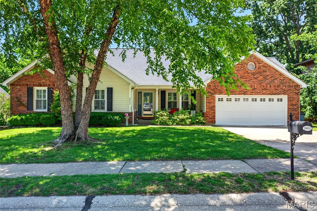 Welcome home to this beautifully maintained 3-bed, 3-bath ranch offering the perfect blend of comfort, space, and convenience in the heart of St. Charles. The spacious great room features a striking tray ceiling and cozy fireplace, while the finished walk-out lower level offers a second fireplace, large rec room, wet bar, private guest suite, full bath, and bonus room with walk-in closet. The kitchen is equipped with soft-close cabinetry and flows seamlessly into the main living areas. The primary suite offers an entire wall of closet space and an updated private bath, while the beautifully renovated hall bath features dual vanities and a relaxing jetted tub. Step outside to enjoy the composite deck and patio overlooking the fully fenced backyard, providing plenty of space for gatherings or a quiet evening outdoors. Enjoy added privacy from the newly planted Evergreen trees in the back yard. Additional updates include an HVAC system with whole-house humidifier and dehumidifier for year-round comfort. Tucked away on a private, non-through street and conveniently located near shopping, dining, entertainment, and quick access to I-70 and Highway 370, this home combines a peaceful setting with unbeatable convenience. Don't miss your opportunity to make this exceptional property your own.