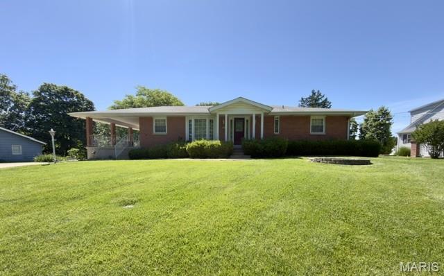 Great opportunity to own 1.4 acres in Sunset Hills.  Fantastic home that needs some cosmetic work on the inside.  3 bed 2 full 1 half bath ranch with huge covered side patio.  Kitchen with breakfast room, separate dining room, living room with woodburning fireplace, family room, primary bedroom w half bath and two additional bedrooms.  Lower level features walk out, rec room, large storage area, full bath and woodburning fireplace.  2 car Tuck under garage.  Septic needs installation but permit granted.  Great for a renovation or build your own custom home.  No subdivision HOA.  Annual road maintenance fee of $300.00.  Property to be sold AS IS.  Buyer to obtain any municipal occupancy permits if applicable.