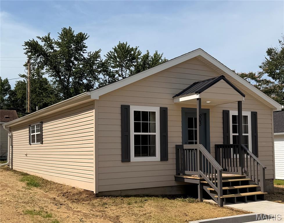 Looking for a move-in-ready home where the big-ticket items are already done? Here it is.

Just a hop, skip, and a jump from Bloomfield Schools, this home has been extensively remodeled from top to bottom. The renovation list is so long, it's easier to tell you what's not new—but we'll try anyway: new HVAC, plumbing, floor joists, sub-flooring, carpet, hardwood and tile flooring, sheetrock, paint, cabinets, doors, windows, remote control ceiling fans, spray-foam insulation, GE stove and dishwasher, freshly paved parking spaces, SEMO Fiber ready hook up, and much more. In short, this home got the full reset-button treatment.

The bright, refreshed interior offers modern finishes and comfortable living spaces, while the extensive mechanical, structural, and cosmetic updates provide peace of mind for years to come. Offering exceptional value, this property delivers quality updates throughout without sacrificing affordability.

Located next to another recently renovated home and near additional properties undergoing improvements, the neighborhood continues to benefit from ongoing investment and revitalization. Whether you're searching for your first home, looking to downsize, or seeking an investment opportunity, this is a property you won't want to miss.

The heavy lifting is done—just move in and enjoy.