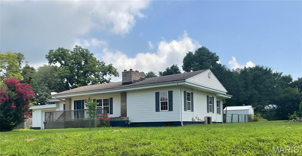 Great location 5 bedroom, 2 bath, main level laundry, full basement on a nice lot.  Fenced backyard.  Alot of original hardwood floors and built ins throughout.  Stone fireplace.
