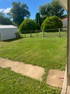 Great location 5 bedroom, 2 bath, main level laundry, full basement on a nice lot.  Fenced backyard.  Alot of original hardwood floors and built ins throughout.  Stone fireplace.