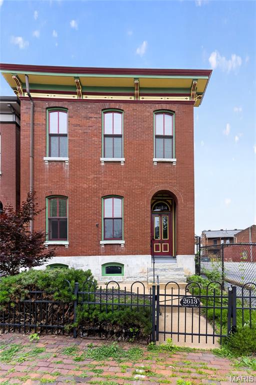 Nestled in the heart of historic Soulard, this beautifully restored gem seamlessly blends timeless character with modern peace of mind. Thoughtfully renovated with all-new systems installed in 2024, this home preserves its original charm while delivering the comfort and reliability today’s buyers are looking for.

Inside, you’ll find three spacious bedrooms, each featuring its own private en suite bath, plus convenient half baths on the main level and in the finished basement—perfect for guests and entertaining. Original architectural details shine throughout, showcasing the craftsmanship and warmth that make historic homes so special.

Step outside to a backyard designed with both relaxation and lifestyle in mind. Premium turf creates a low-maintenance outdoor retreat that’s ideal for entertaining, playtime, or giving your four-legged family members the perfect place to roam. A brand-new two-car garage adds even more value and convenience.

Located in one of St. Louis’ most vibrant and welcoming neighborhoods, this Soulard stunner offers the perfect mix of history, community, and modern living. Whether you're hosting friends, enjoying neighborhood favorites, or making memories with loved ones—furry ones included—this home is truly something special.