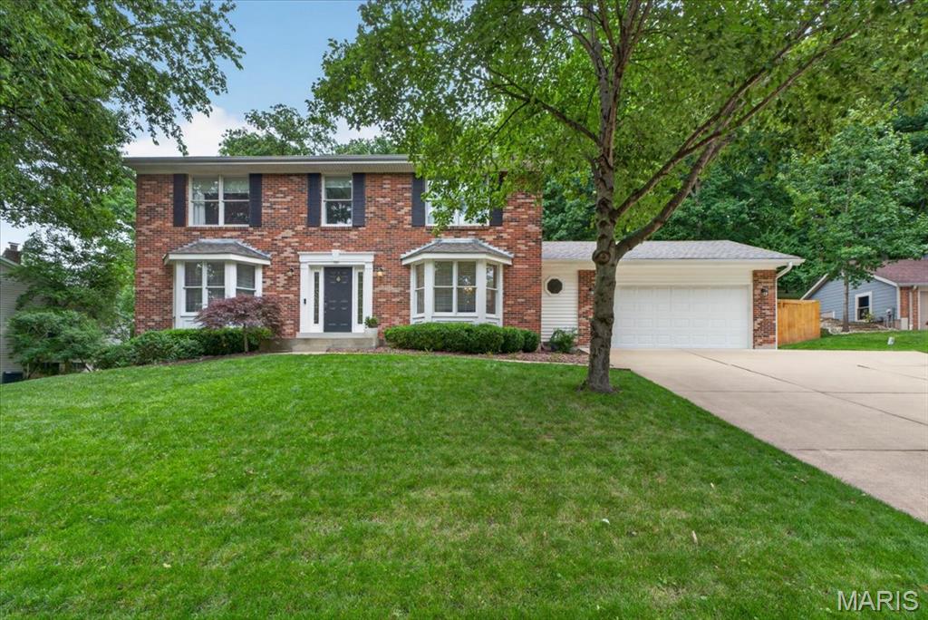 A beautiful 2-story in Chesterfield awaits it’s new owner. Featuring 4 bedrooms and 3.5 baths, with a functional layout and stylish updates, you won’t want to miss this one. Hardwood floors on both levels and luxury vinyl plank flooring in the finished lower level, create both warmth and durability. The family room showcases a brick surround fireplace and built in bookcases, while the kitchen offers granite countertops, double ovens, and easy access to the patio for effortless entertaining. Spacious primary suite includes an ensuite bath with separate tub and shower along with a walk-in closet. The finished lower level is ready for gatherings with a full bath, granite topped entertainment bar and double wine refrigerators. Enjoy the fully fenced backyard where extensive honeysuckle clearing has opened space for a great fire pit area and swing. A move-in ready home with indoor and outdoor spaces designed for everyday living and entertaining. All this and a 1 year Home warranty. Welcome Home!!
