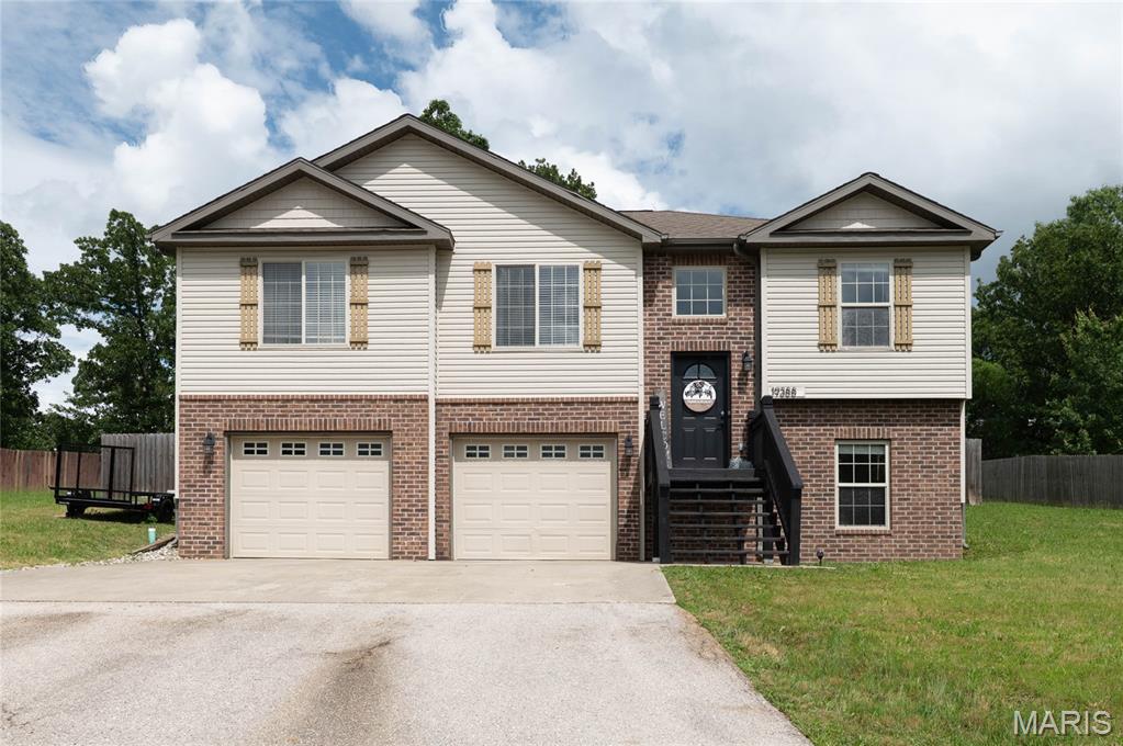 Welcome home to this spacious and beautifully maintained split-level residence in the desirable Shalom Mountain subdivision. This 3-bedroom, 3-bath home delivers the perfect blend of comfort, functionality, and style. The bright, open-concept main level features a welcoming living room, dining area, and a well-appointed kitchen ideal for everyday living and entertaining. Retreat to the private primary suite featuring a double vanity, generous storage, and a large walk-in shower. The finished lower level provides exceptional flexibility with a large family room, full bath, and additional space perfect for a home office, recreation room, guest suite, or fitness area.
Step outside to enjoy the rear deck overlooking the yard—an ideal setting for morning coffee, weekend barbecues, or relaxing evenings. Situated on a generously sized lot in an established neighborhood, this property offers convenient access to shopping, dining, schools, and Fort Leonard Wood. Whether you're searching for your next family home or a property with room to grow, this move-in-ready home checks all the boxes with space, versatility, and a location you'll love. Extra features: Brand new carpet throughout the house, new water heater, newly designed bathroom cabinets and mirrors and new built in electric fireplace.