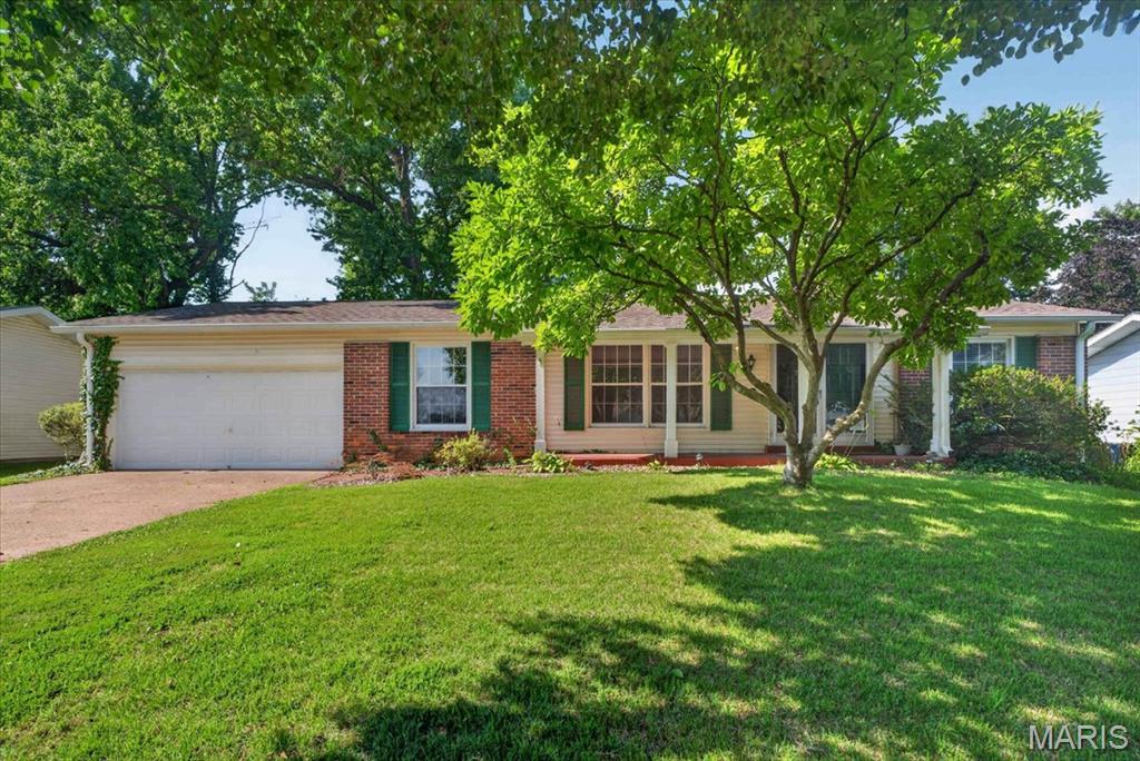Welcome home to this beautiful 3-bedroom, 2-bath 1568 sq ft ranch in the desirable Wedgwood neighborhood! Fresh paint and new flooring in all the right places give this home a bright, modern feel, while the spacious layout offers room for everyone to spread out and enjoy. The main level features a spacious living room, separate dining room, and a large family room with a gas fireplace, creating the perfect space for everyday living and entertaining. The primary bedroom features dual closets and an updated full bathroom. Downstairs, the partially finished lower level provides even more living space that's ideal for a recreation room, home office, playroom, or workout area but still leaves plenty of space for storage. 

Step outside and you'll fall in love with the gorgeous backyard! Whether you're hosting summer barbecues, relaxing with your morning coffee, or enjoying a quiet evening outdoors, the large covered patio overlooks the spacious yard, creating the perfect setting for entertaining or simply unwinding.

Additional features include a 2 car garage, updated bathrooms, hardwood floors, six-panel interior doors, updated HVAC unit (2025), water heater (2025), electrical panel (2023), and a roof, gutters, and gutter guards replaced in 2020. Located just a short walk from Wedgwood Park, this move-in ready home offers the perfect combination of comfort, updates, and convenience. Don't miss your opportunity to make this wonderful home your own!