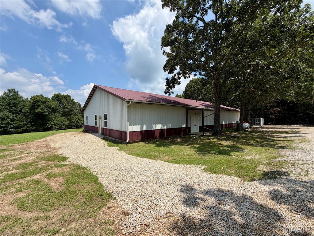 Here are the key takeaways:

• Property type: 3+-acre multi-purpose, 50x100 metal building between Salem and Rolla.
• Spray foam insulation
• Utilities: Electric, septic, shared well
• Commercial building: 50x100 structure with office, storefront, storage rooms, bathroom, and workshop with garage door; partial living quarters already in place and convertible to multiple living units.
• Site features: 6-foot chain-link fenced backyard area behind the building; ample space for repair/sales business while maintaining rental income.
• Income potential: Expandable rental portfolio with mixed-use options (commercial + residential); opportunities to convert building to additional rentals or operate a business on-site.
• Call to action: Private showings available.