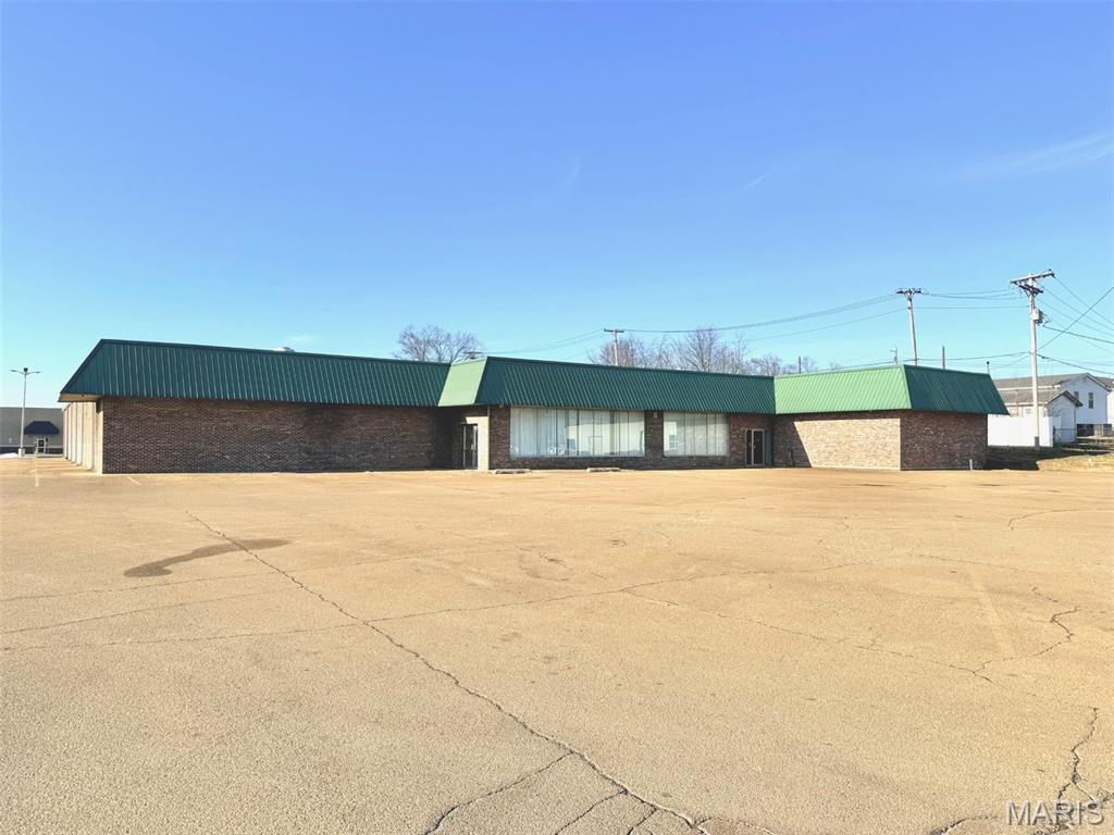 Great value-add redevelopment opportunity!  This vacant, 23,166 SF free-standing building, built in 1981, sits on 1.62 acres.  Situated along Lincoln Dr. just off of Hwy 72 in Fredericktown, this property provides a versatile canvas for investors or owner-users to reimagine and revitalize.  The office layout allows for a wide array of uses, making it an appealing building for those seeking a large commercial asset.  With abundant space and a sturdy all-brick structure, this property presents an exceptional opportunity for investors or users looking to bring something new to the area.  Don't miss out on the potential of this great location!