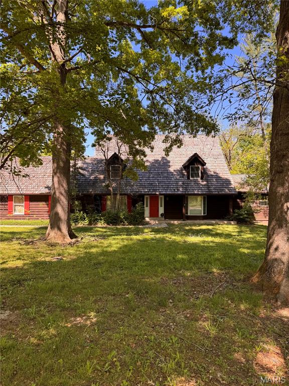 Opportunity in Mason Valley.  This 3 bedroom 3.5 bath home sits on a beautiful .65 acre wooded lot that backs to common ground.  Situated on a quiet culdesac, the home has a main floor primary suite, vaulted two story ceiling in the great room featuring a stone faced fireplace, hardwood floors and a large bar. The deck look out over a large backyard. Home being sold "As Is" and a liability waiver must be signed to view the home.