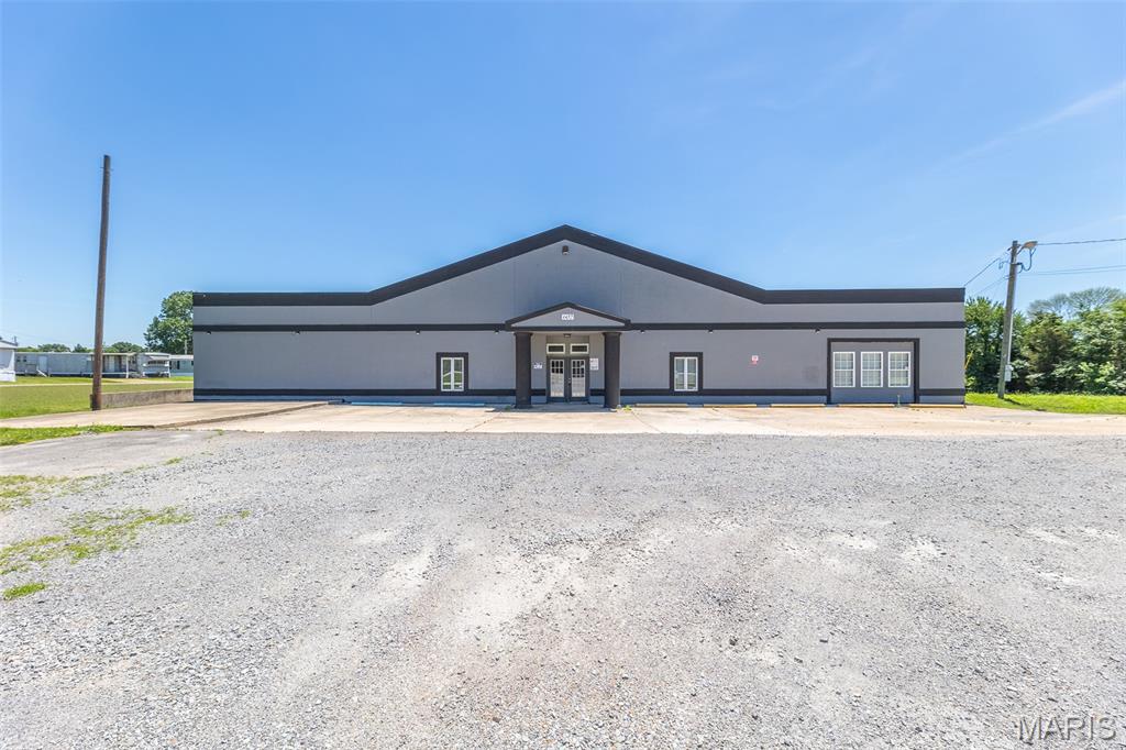 Positioned on approximately 3 acres m/l with prominent E. Outer Road frontage and convenient access to the highway, this versatile commercial property offers endless possibilities for investors, business owners, and entrepreneurs alike. The impressive 8,000 sq. ft. building is divided into approximately 4,000 sq. ft. of shop/warehouse space featuring five oversized bay doors, plus 4,000 sq. ft. of freshly remodeled office, retail, or multi-use space designed to accommodate a wide variety of business operations. The property is improved with asphalt parking and drive areas, secure fencing, and ample room for equipment storage, fleet parking, future development, or expansion. The flexible layout creates opportunities for owner occupancy, multiple tenants, or income-producing rental configurations. High traffic exposure, excellent accessibility, and a highly functional setup make this a rare commercial offering with significant upside potential. Whether you’re looking to grow your business, expand your investment portfolio, or develop additional income streams, this property checks all the boxes. 

Office space available for lease, MLS# 26036174