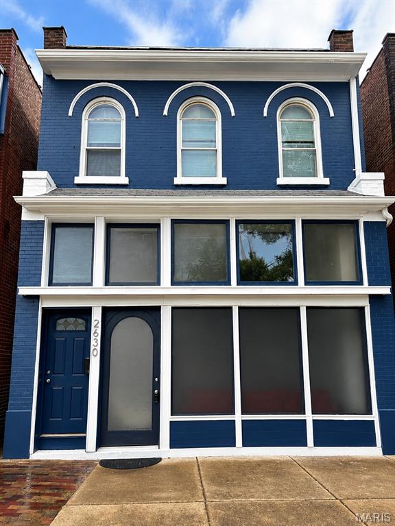 Welcome to a truly unique mixed-use opportunity in the heart of St. Louis—perfect for those looking to live, work, play, and stay all in one place.

This historic Italianate-style brick building blends character with versatility. The upper level features a spacious 2-bedroom, 1-bath residential unit filled with natural light and classic architectural charm, including arched windows and timeless details.

The lower level offers a one-of-a-kind studio-style space with a full bathroom, ideal for a home office, creative studio, small business storefront, or additional living/lounge area. The flexible layout allows you to customize the space to fit your lifestyle or income-producing needs.

Additional highlights include a 2-car garage, providing convenient off-street parking—a rare find in the area.

Whether you're an entrepreneur, investor, or homeowner seeking a live/work setup, this property delivers unmatched potential. Even better, this property may qualify for up to $50,000 in down payment assistance through SLDC programs, making ownership more accessible than ever.

Don’t miss your chance to own a versatile property with endless possibilities in a prime St. Louis location!