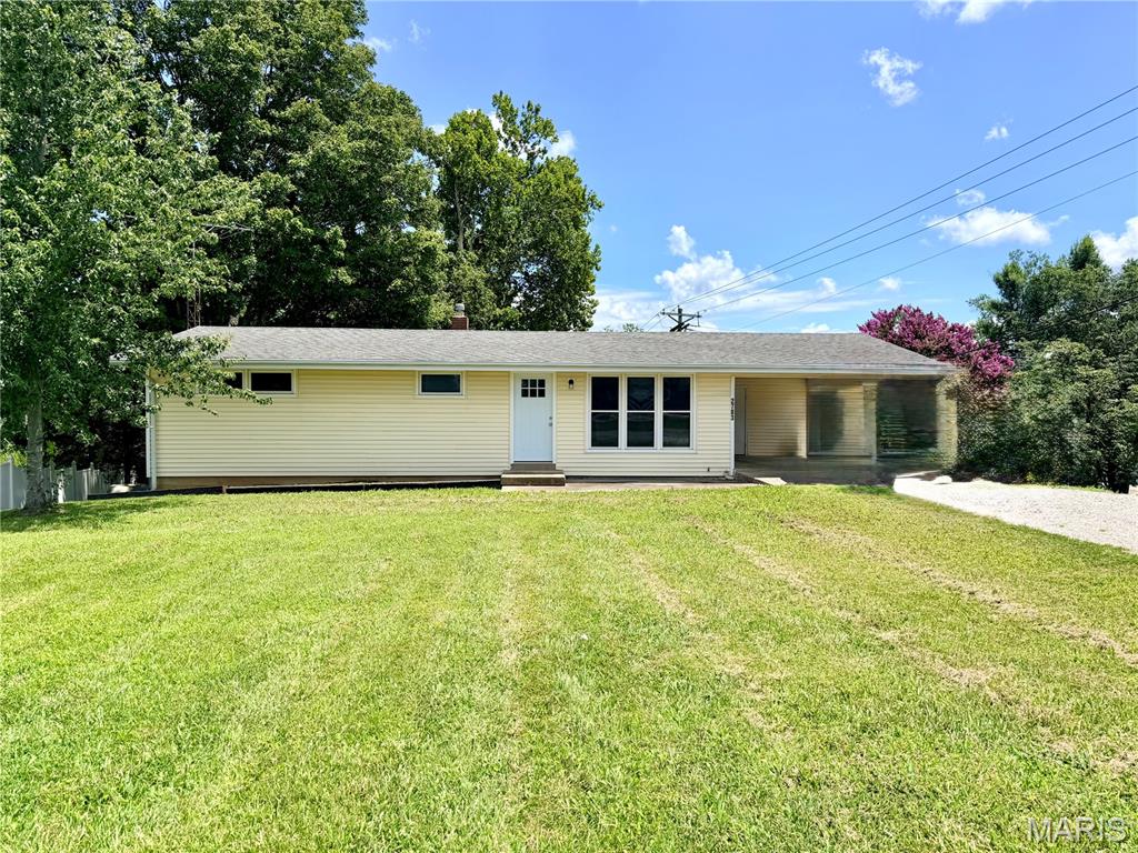 Completely renovated from top to bottom, this beautiful home offers the perfect blend of modern updates and peaceful country living. Located on the outskirts of Perryville, you'll enjoy the privacy of a rural setting while being just a few miles from local schools and town amenities.

Step inside to discover a brand-new kitchen, fresh paint, new flooring, and a spacious, beautifully updated bathroom. The redesigned floor plan features opened-up living spaces and contemporary finishes, creating a bright, welcoming atmosphere that's truly move-in ready.

The partially finished basement provides even more opportunity, with two additional rooms just waiting for your finishing touches. Whether you envision a home office, theater room, game room, workout space, or guest rooms, the possibilities are endless.

Step outside from the walk-out basement to a shady backyard that's ready to become your own private oasis, perfect for relaxing, entertaining, or enjoying the peaceful surroundings.

If you're looking for a turnkey home with modern updates, extra space to grow, and a convenient location, this one is a must-see. Schedule your private showing today!