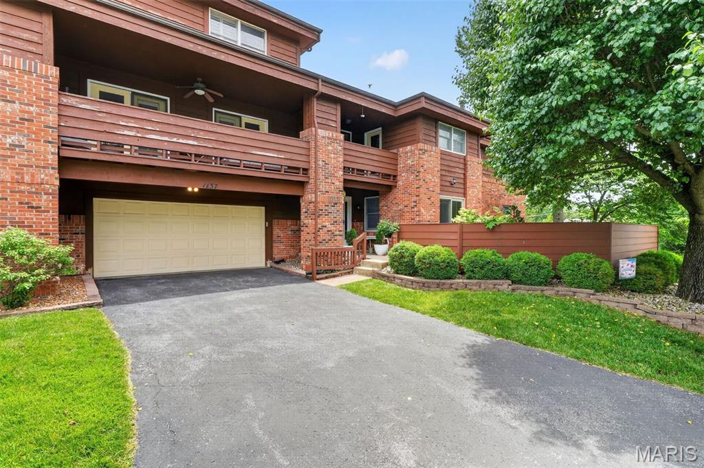 Welcome to this darling condo in the desirable Aspen Ridge Condominiums! You’ll love the convenience of your own private driveway and oversized 2-car garage in this corner, main-level unit. With just two steps to the front door, this condo offers easy and comfortable access in a fantastic location. Step onto the covered front porch and into a bright, open living space filled with natural light, ample recessed lighting, and views overlooking a very private patio — perfect for relaxing or entertaining guests. The eat-in kitchen features a pantry, stainless steel appliances, and opens seamlessly to the dining and family room, creating a wonderful flow throughout the space. Newer baseboards and luxury vinyl flooring (~3 years old) extend throughout the main living areas. Just off the family room is a versatile bonus room that can easily function as a guest bedroom, office, or flex space. Down the hall, the spacious primary suite offers a large walk-in closet and en-suite bathroom complete with a walk-in shower. Main-floor laundry and additional room for storage make this unit ideal for easy, low-maintenance living. Be sure to check out the community pool (available for an additional annual fee of approximately $195/year) and enjoy the convenience of shopping, dining, and entertainment just minutes from Manchester, Clarkson, Clayton, and Kehrs Mill. Stop by today!