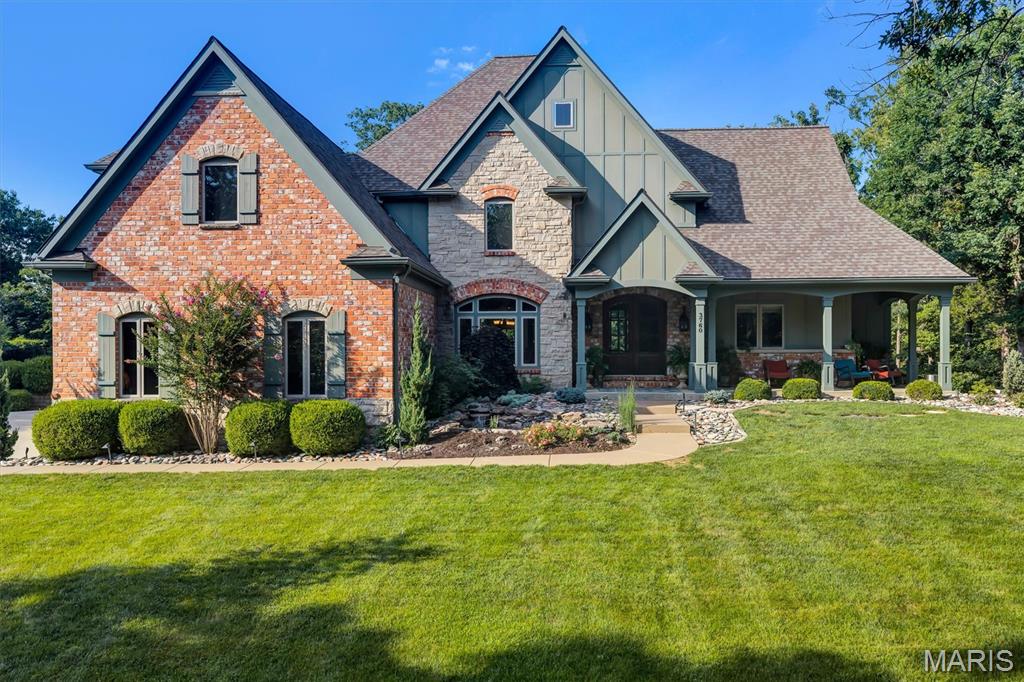 Coming Soon! Showings start 7/11- Open House Sunday, 7/12 from 12-3! Experience luxury living in this exceptional custom-built 1.5-story estate nestled on 5 picturesque acres, offering remarkable privacy and a resort-style backyard complete with a stunning inground pool. From the custom mahogany front door to the dramatic two-story foyer with elegant tile flooring and a sweeping staircase, every detail reflects timeless craftsmanship and sophistication.

Designed for both everyday comfort and grand entertaining, the home showcases exquisite millwork, crown molding, and premium finishes throughout. The impressive two-story great room features soaring windows that fill the space with natural light, complemented by a striking floor-to-ceiling stone fireplace.

The gourmet kitchen is a chef's dream with custom cabinetry, a spacious center island with breakfast bar, built-in refrigerator, gas range, beverage chiller, and an adjoining breakfast room. Just beyond, the vaulted hearth room offers built-in cabinetry and a cozy fireplace, creating the perfect space to gather with family and friends.

The luxurious main-level primary suite serves as a private retreat, featuring heated flooring, two walk-in closets, and a spa-inspired bath with dual vanities, a jetted soaking tub, and a walk-in shower. Upstairs, you'll find three additional bedrooms, three full bathrooms, and a versatile bonus room.

The finished walk-out lower level expands the home's living space with an impressive entertainment area featuring a bar, mini kitchen, spacious family room, dedicated workout room, full bathroom, and two additional bonus rooms that offer endless flexibility for guests, hobbies, or home office space.

Step outside to your own private oasis. The beautifully designed 20' x 40' saltwater-enabled inground pool is complete with an automatic safety cover and diving board, while composite decking, multiple patios, and expansive level yard space create the perfect setting for outdoor entertaining and relaxation.

Additional highlights include main-floor laundry, two main-level powder rooms, a three-car side-entry garage, and countless thoughtful details throughout. This extraordinary estate offers an exceptional combination of luxury, comfort, and privacy in a truly breathtaking setting.