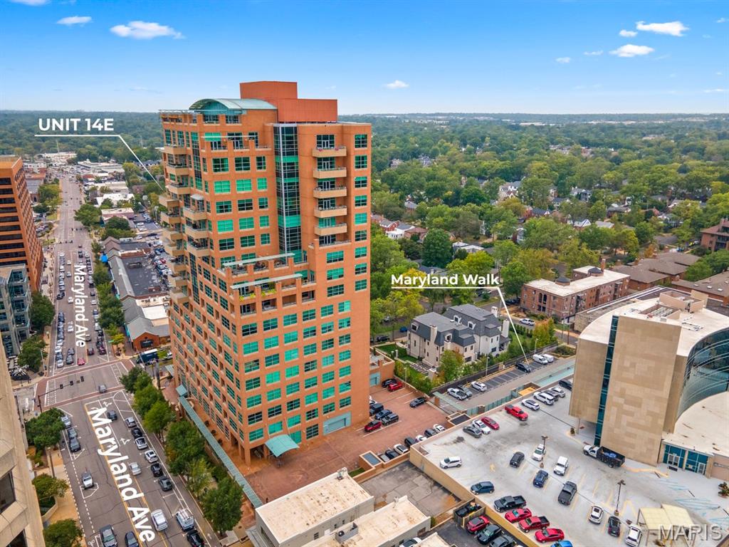 Stunning corner unit in the heart of Clayton with Arch Views! Welcome to this meticulously maintained, light-filled condo offering luxury, comfort, and unbeatable location. Featuring 2 spacious bedrooms, a dedicated home office with custom built-in bookshelves and desk, and soaring 11-foot ceilings, this residence blends elegance with functionality.  The gourmet kitchen is a chef’s dream, outfitted with Viking appliances, a wine fridge, and sleek finishes. Enjoy the convenience of a large laundry room complete with washer and dryer, and  two full / one half baths. Step out onto your private south- and east-facing balcony to take in breathtaking views of the St. Louis Arch—perfect for watching fireworks on the 4th of July or catching hot air balloons drifting by from Forest Park. Premium amenities include: Two deeded parking spaces near the elevator, nearby private storage unit, 24-hour security & doorman, fitness center, dog park, and heated outdoor pool; three guest suites, a  party room with a full kitchen and bar that leads to a rooftop lounge.  From individually chosen imported floor tiles to a hand-painted alcove, there are too many unique and elegant finishes to name  - you must see it to fully appreciate. Located in the highly-rated Clayton School District, this home is just moments from upscale shopping, beautiful parks, fine dining, and the vibrant business district. Don’t miss this rare opportunity to own a luxurious retreat in beautiful Maryland Walk.