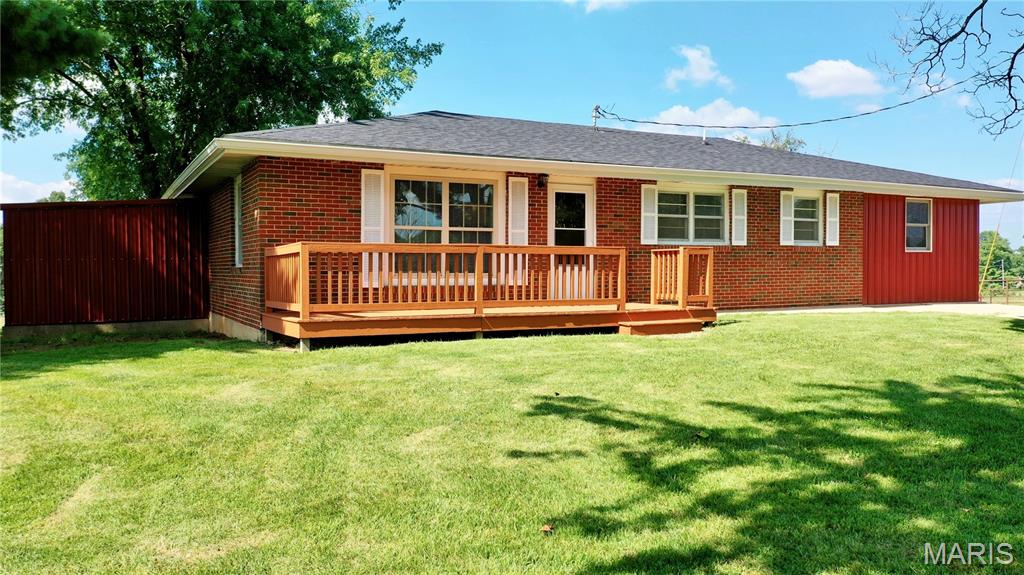 Dreaming of the homestead lifestyle? This 9.7-acre mini farm is ready for you and your livestock! The updated 3-bedroom, 1-bath home was gutted to the studs and rebuilt with new drywall, fresh paint, flooring, light fixtures, electric service, and nearly all new windows. New roof and gutters (2023). The modern kitchen features new cabinets, pantry, countertops, and appliances. Living room and family room for space to expand. A large laundry/mudroom offers space for a 2nd bath, while the full, dry basement provides room for expansion. Outside, a rotational grazing system offers 7 separate pastures, plus an alley that could serve as an 8th. Fenced and cross-fenced with woven wire and one strand of barbed wire on top, with a concrete waterer, hydrants, pipe corral, 30x48 hoop barn, livestock lean-tos, and double gates off the county road for easy animal access. Well with 2 pressure tanks and updated wiring. Central A/C, outside wood furnace with electric backup heat. Average electric bills of just $150-$200/month! This property won't last long, schedule a private showing today!