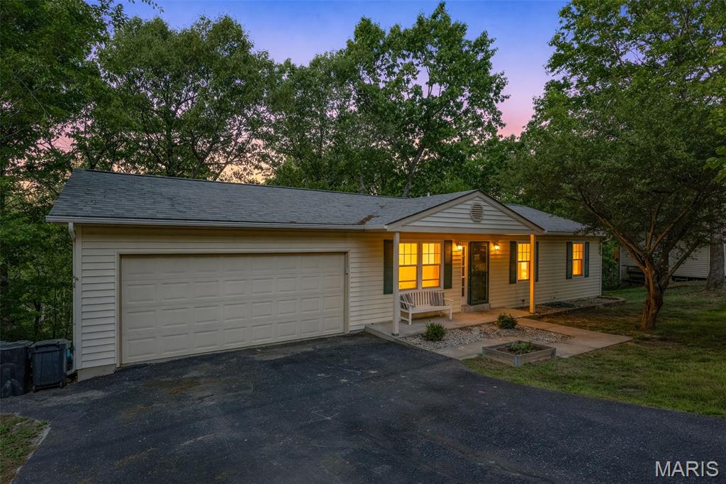 Welcome to your perfect blend of comfort, space, and tranquility! Nestled on a generous 0.95-acre lot, this beautifully designed 3-bedroom, 2-bath home offers the ideal setting for both everyday living and entertaining.
Step inside to discover an inviting open-concept floor plan highlighted by vaulted ceilings that create a bright, airy atmosphere throughout the main living area. The living room flows seamlessly into the dining area and kitchen, making it perfect for gatherings with family and friends. The home features three bedrooms, including a comfortable primary suite with a private bath. A second full bathroom conveniently serves the additional bedrooms and guests.
Downstairs, you'll find a full walkout basement offering endless possibilities—whether you envision a recreation room, home gym, additional living space, or plenty of storage. Step outside and enjoy the outdoors from your newly built deck, perfect for morning coffee, evening relaxation, or hosting gatherings while overlooking your expansive yard. With nearly an acre of land, there’s ample space for outdoor activities. The attached 2-car garage adds convenience and additional storage. This property offers the space you’ve been searching for with the comfort of modern living—don’t miss your chance to call it home!
