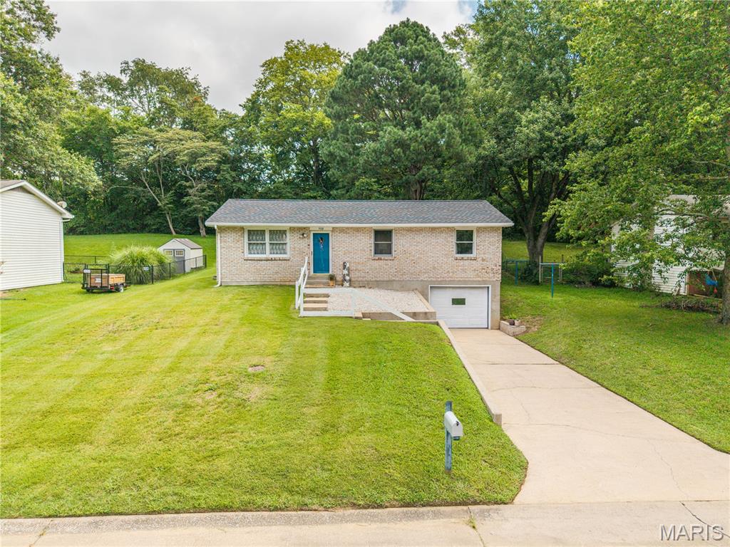 Conveniently located on a dead end street and within walking distance to litz park sits this 3 bedroom, 2 full bathroom home. This home has been tastefully updated including flooring, new interior doors, fresh paint, and a new roof.  Upstairs offers three bedrooms, and one full bathroom. Downstairs features a tuck under single car garage, bonus room, and full bathroom. This home has been well maintained and is awaiting its new owner