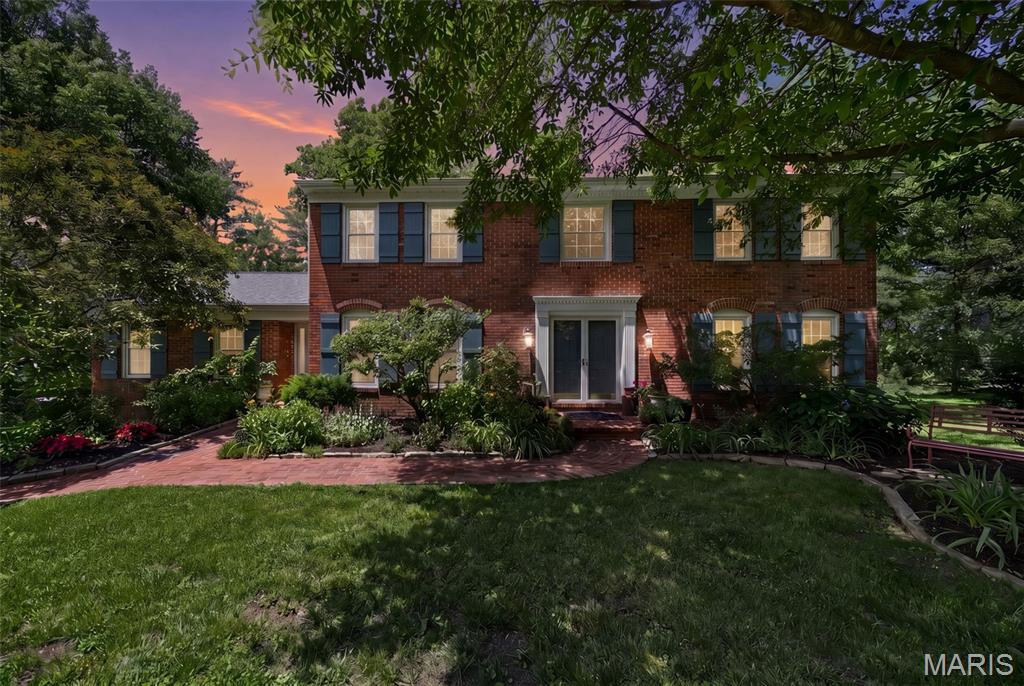 Set on a stunning one-acre lot at the end of a quiet cul-de-sac in the heart of Town & Country, this home offers something increasingly rare: a private, tree-lined retreat with a walkable lifestyle built right in. Stroll to the Town Square for boutique shopping, dining, and live music, or take in the community events that bring neighbors together throughout the year. Miles of walking and biking trails wind through stunning parks in every direction, and all within a couple of miles from your front door. This is the Town & Country lifestyle at its best.

Inside, the gracious foyer opens to formal living and dining rooms with classic architectural details and newly refinished wood floors throughout. The family room draws you in with a beamed ceiling and cozy fireplace, flowing naturally into the brand-new kitchen and breakfast nook. Thoughtfully designed for real life, the kitchen offers a beautiful layout and a view of the backyard that keeps you connected to the outdoors while you cook.

A first-floor office or optional bedroom, a dedicated full bath, laundry room, and a powder room round out the main level. Upstairs, the spacious primary suite offers a private bath and walk-in closet, with three additional bedrooms and a full bath giving everyone their own comfortable space. The finished lower level provides flexible room for movie nights, play, or a teen retreat, and the walk-out basement includes a sixth bedroom and full bath, ideal for guests or multi-generational living.

Step outside and the property itself becomes a destination. A meandering creek adds a peaceful, natural backdrop to the spacious, flat yard, while established landscaping delivers beauty and character throughout every season. Whether you are hosting a summer gathering, letting kids roam, or simply enjoying a quiet morning with coffee, this backyard delivers. Located in a highly-rated school district, and minutes from countless prestigious private schools, this home offers the space, the setting, and the community that define the very best of Town & Country living.