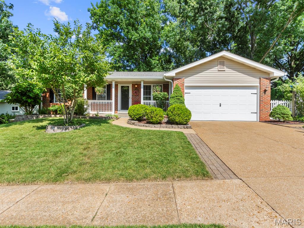 Waiting for you - a home nestled on a cul-de-sac on a just under 1/4 acre lot and backing to mature woods.  This updated home offers new flooring throughout, crown molding, updated kitchen and baths, finished lower level and a large patio in the fully fenced yard. Enter to enjoy the new vinyl plank flooring in the main living area.  The updated eat-in kitchen offers great storage, peninsula bar seating and space for your family dining table.   Down the hall is the primary ensuite with updated bath, two additional bedrooms and an updated hall bath. All bedrooms offer brand new carpet.  The finished walk-out lower level provides a large family room, a versatile bonus room ideal for a home office, gym, or playroom – use your imagination!  The lower level is completed with a laundry room providing great storage space and a cedar closet. Outside, enjoy the large patio against the peaceful, wooded backdrop.  A short walk into the woods takes you to the riverside for a great family adventure! Refrigerator, washer and dryer stay.  New roof, siding, facia, gutters & gutter guard 2025, Roof 1 year old, HVAC 5 years old!  (Some Photos Virtually Staged) Everything is all done and ready for you to move in - come see your new home on Yellow Jacket Place!