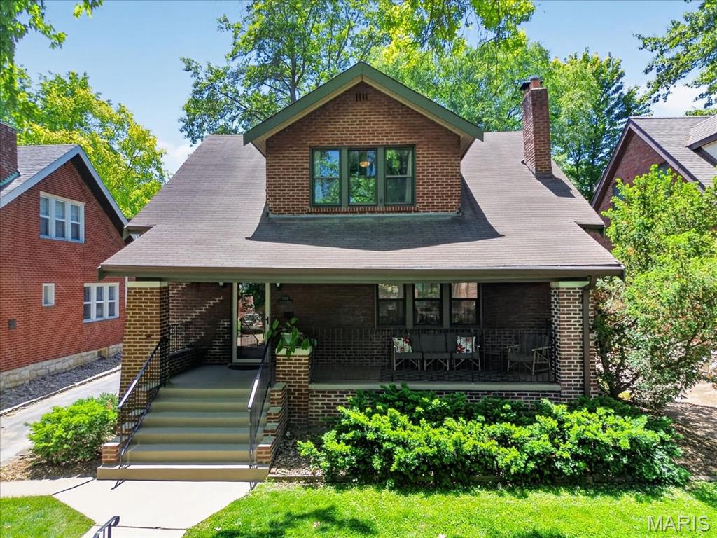 Charming 2 Story lovingly updated with newer half bath on main and hall full bath on 2nd floor.  Beautiful updated kitchen open to dining room and overlooks backyard.  Covered front porch and wood deck in backyard for your relaxing and entertaining. AC updated with mini-split system. Living room has built-ins and woodburning fireplace. 2nd floor features 3 bedrooms w/oversized closets. More features include arched entryways, crown molding, inlaid wood floors. Walk to schools, parks, shops and restaurants. Minutes to the Delmar loop & Downtown Clayton.