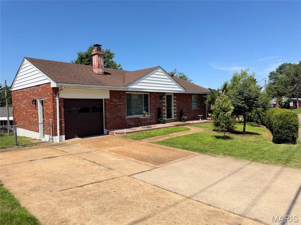 Beautifully restored, brick ranch home on a large lot with an attached garage and an abundance of quality finished space to enjoy. Open the door to your amazing living room with a designer fireplace tiled and powered for life! Refinished hardwood floors, new lighting, fresh paint - clean, functional, and fabulous. 3 main floor bedrooms. 1 updated hall bath. Primary suite has an attached private half bath. 2026 brand new kitchen with new tile, new high-end cabinets, granite counters, premium appliances - extra space for a breakfast table and friends. Lower level walks out to a wonderful yard with an orchard of cherries, pears, apples and more! Downstairs is a full bath, spacious and equipped laundry area, private office or additional sleeping area, and a wide-open rec space with so much room to style as fits your life. New HVAC in 2026! Across from Affton Pizza and blocks from Interstate 55, this home is convenient and amazing!